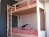Bedroom with a bunk bed, 1 double settee-bed and a wardrobe.